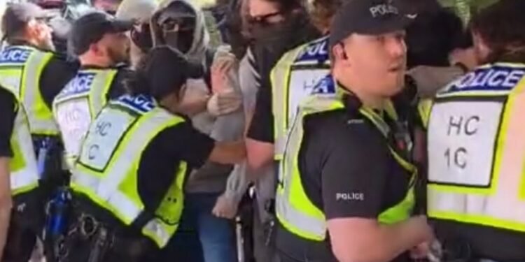 Masked Anti-racism hooligans attempt to disrupt peaceful protest outside Highfield House Hotel in Southampton